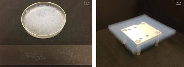 Campioni di aerogel di silice traslucido azzurrognolo su un piano da laboratorio