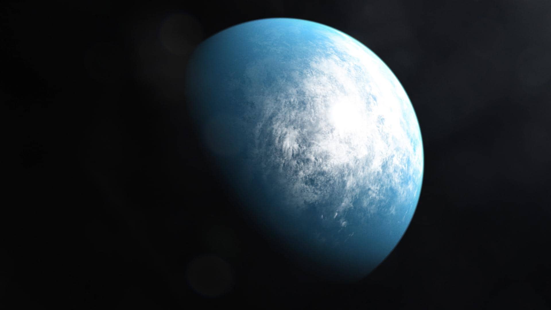 Illustrazione artistica del sistema planetario TOI 700 con un esopianeta di taglia terrestre in orbita attorno alla sua stella nana