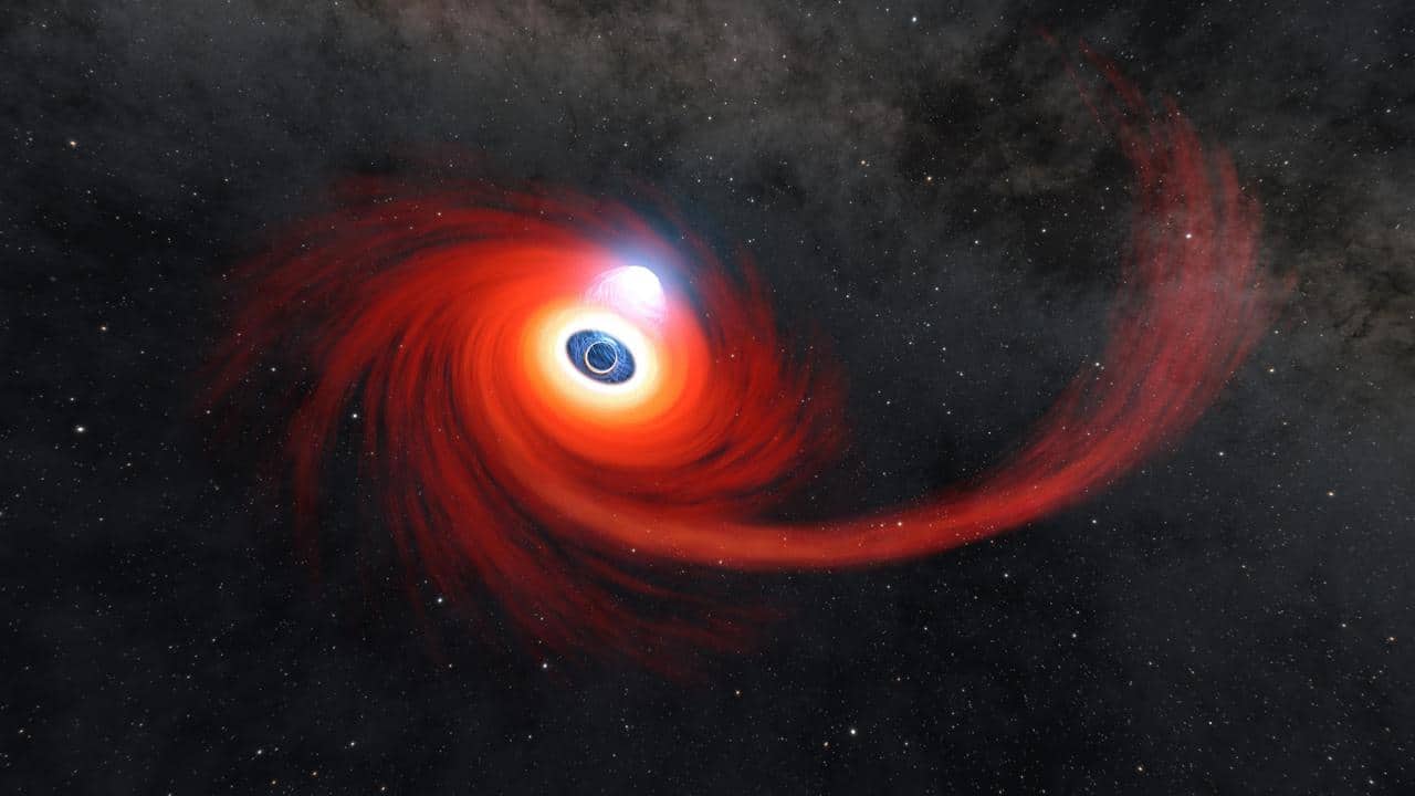 Illustrazione artistica di un buco nero supermassiccio che divora una stella