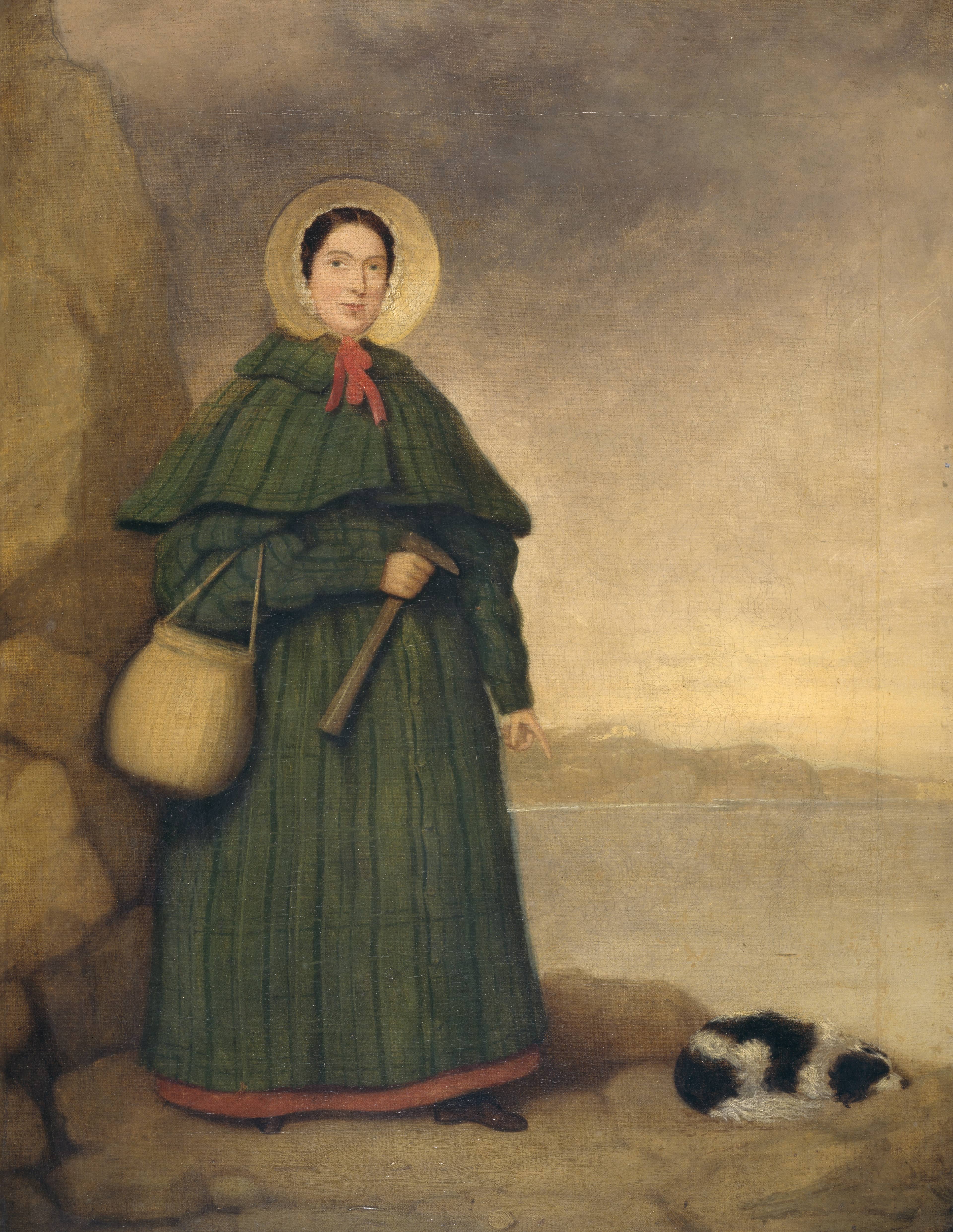 Ritratto di Mary Anning con il cane Tray e il martello da geologa sulle scogliere di Lyme Regis