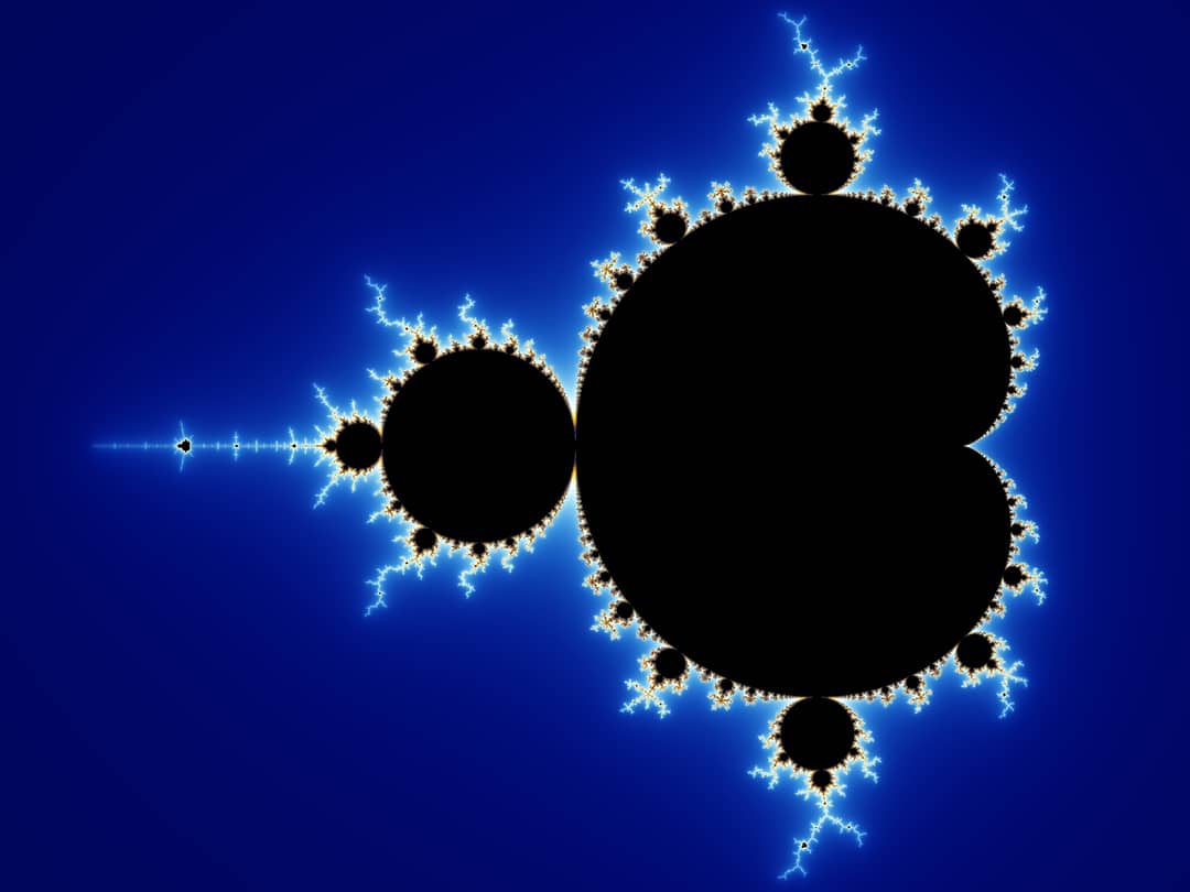 Insieme di Mandelbrot completo: figura nera a forma di cardioide circondata da gradiente colorato